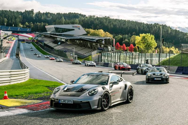 Porsche on track with instructor